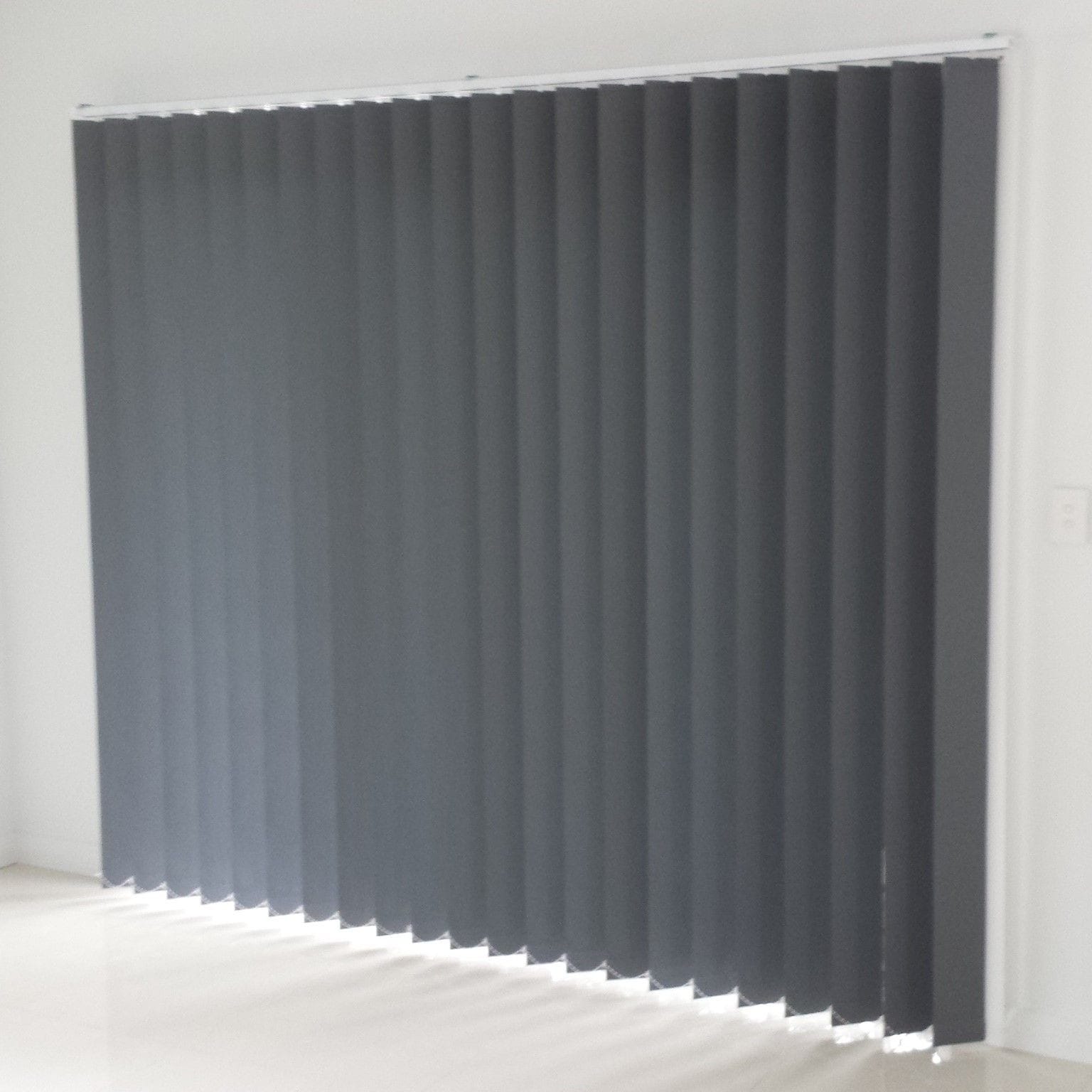 Vertical Blinds are custom-made to fit your window using high-quality fabrics such as Blockout or Sheer. This product offers Vertical Blinds using 89 mm slats.